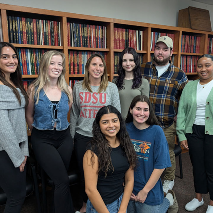 Professor Rachael Record (second row, third from the left) with the Fall 2025 cohort after they completed their research presentations to their faculty mentors and School of Communication administrators (Photo courtesy of Rachael Record)